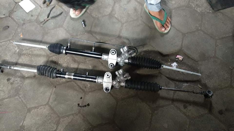 Share ganti steering rack Aerio merk KYB dan pompa power steering
