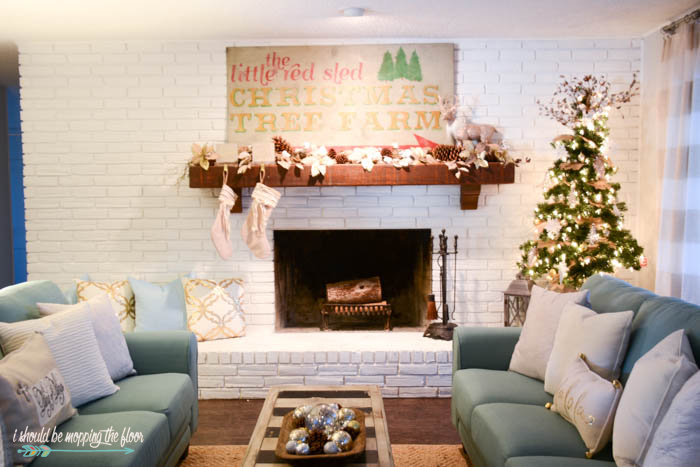 Gold, silver, and cream living room Christmas decor ideas.