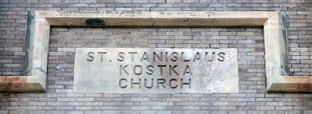 Exterior limestone plaque engraved with name of church