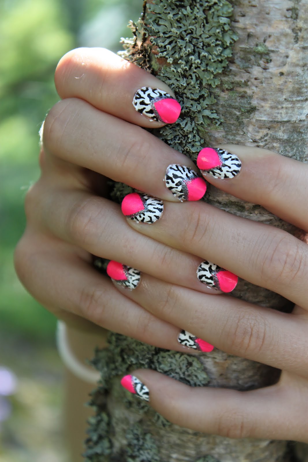 Crazy About Nails Neon pink and white zebra nails