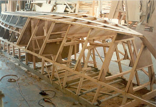 small wooden boat building
