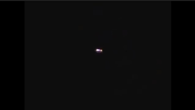 UFO evidence caught on camera flying past an airport. UFO evidence caught on camera flying past an airport.