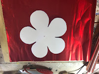 Flower template on top of sheet