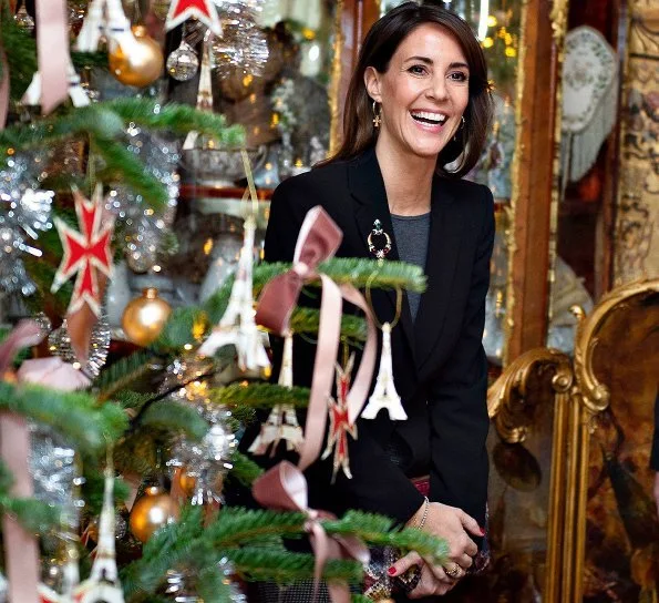 Princess Marie attended Christmas celebrations at Voergaard Castle in Vendsyssel. Giorgio Armani blazer and her Jimmy Choo Glynn boots