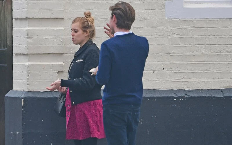 Pregnant Princess Beatrice wore a blobpy black tweed classic-collar jacket from Maje, and black boots from Maje Paris