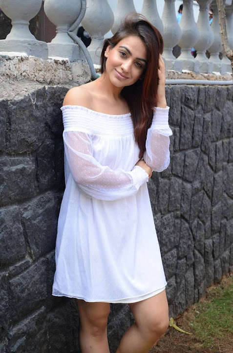 Aksha Pardasany in white dress