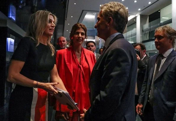 On the first day of the G20 Summit, Queen Maxima wore a colour-block wool midi dress by Michael Kors. Juliana Awada