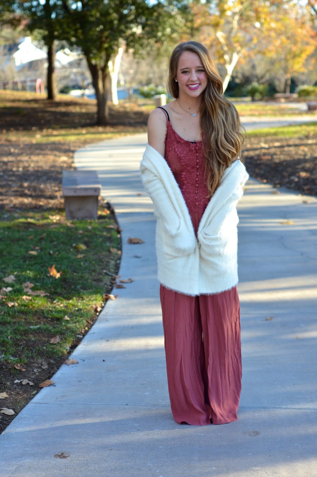 The Teacup of Style: lace jumpsuit + white fuzzy cardigan