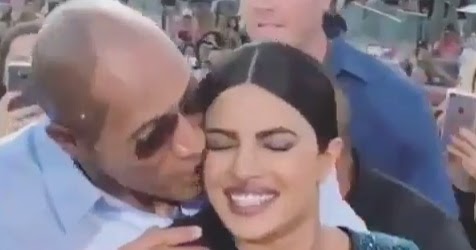 PRIYANKA CHOPRA GETS A SURPRISE KISS FROM DWAYNE JOHNSON - latest