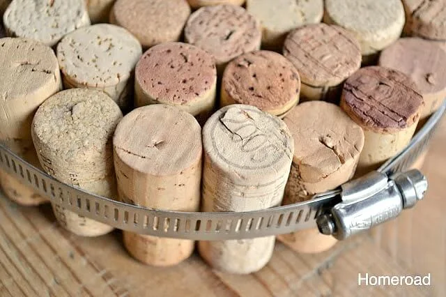 Corks glued together in a plumbers clamp.