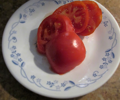 Slicing into a red ripe tomato is so good in October