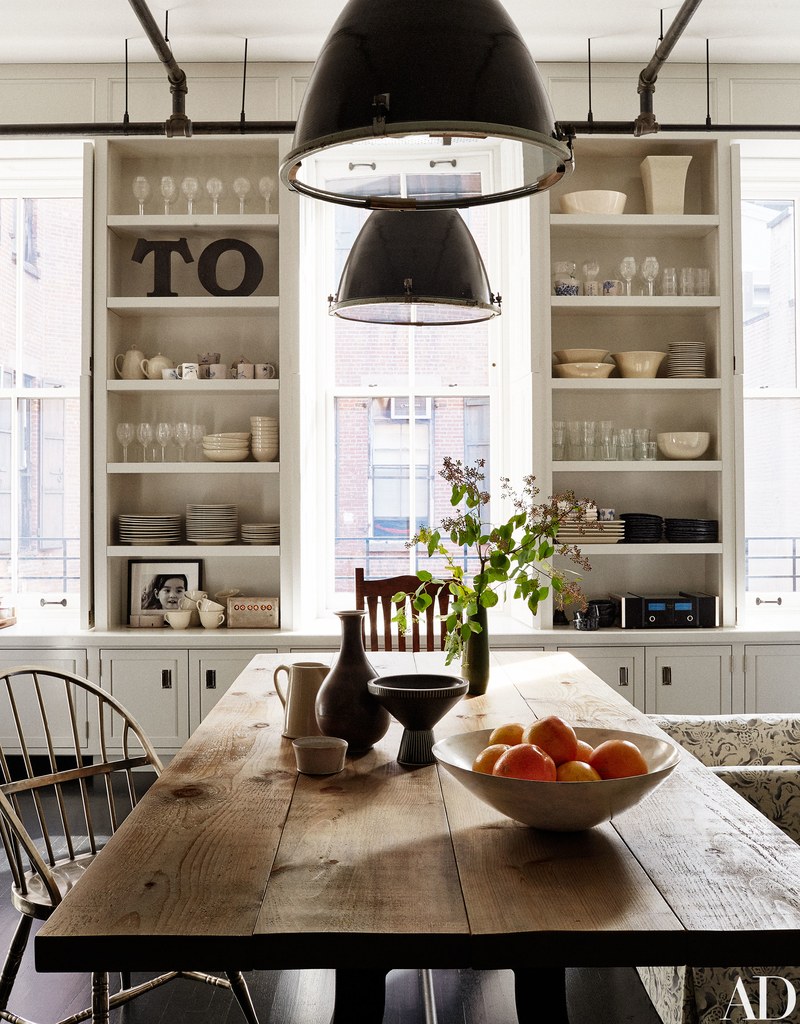 Magnificent industrial farmhouse kitchen wih white builtin shelves and farm table #modernfarmhouse #farmhousekitchen