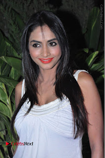 Actress Model Pooja Sri Stills in White Short Dress at F Club pre soft Launch  0001