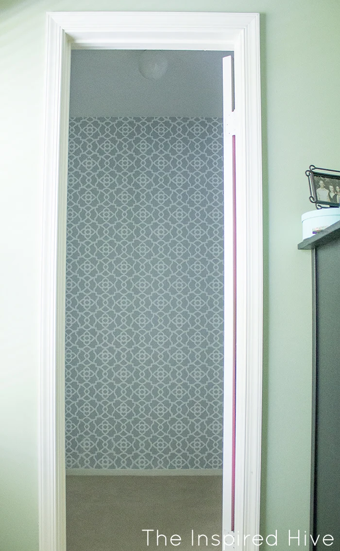 Part one of a beautiful walk in closet makeover! How to stencil a feature wall using Royal Design Studio stencils.