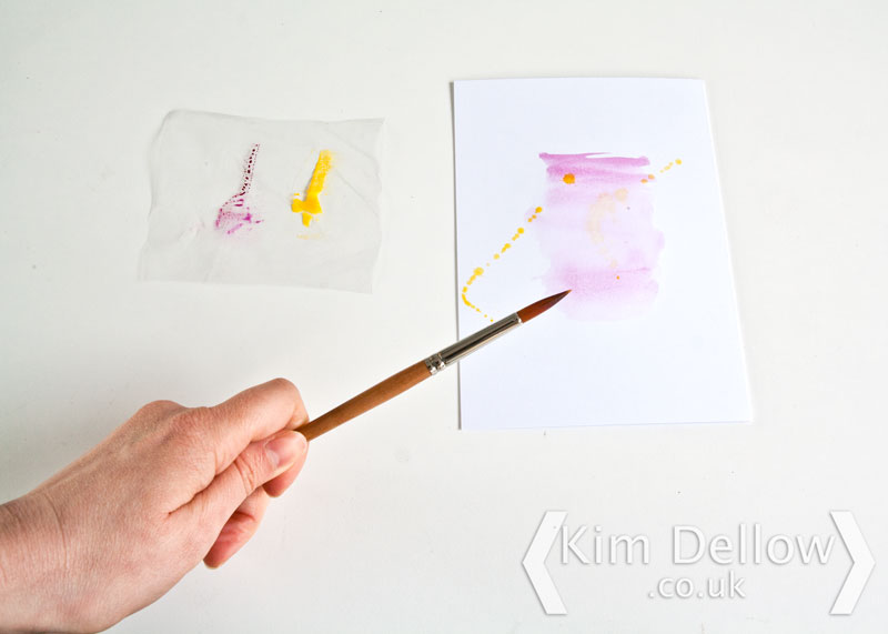 flick colour onto the surface with a brush