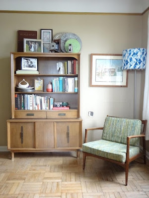 Wooden mid-century bookcase in living room idea