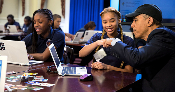 President Obama with children learning computers