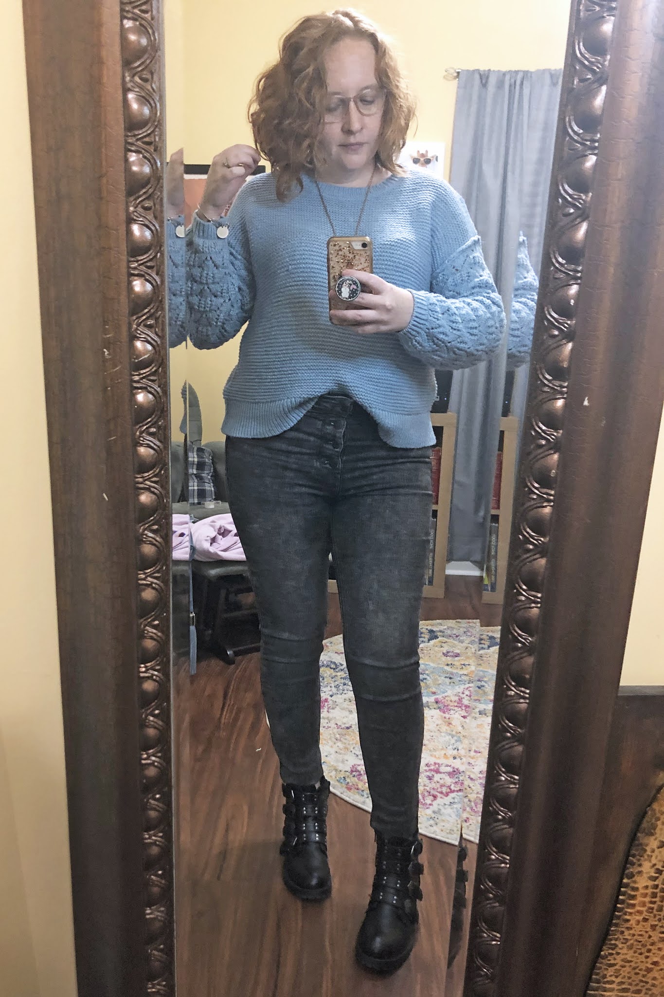 blue_sweater_gray_jeans_moto_boots