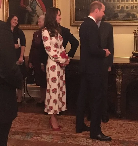 Queen Elizabeth, Prince William, Catherine, Duchess of Cambridge, Prince Harry, Princess Anne and Prince Edward. Kate Middleton wore Alexander McQueen Silk Floral Midi Dress 