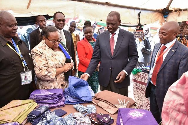 Deputy President of Kenya H.E. Hon. William Ruto admires products from SMEs