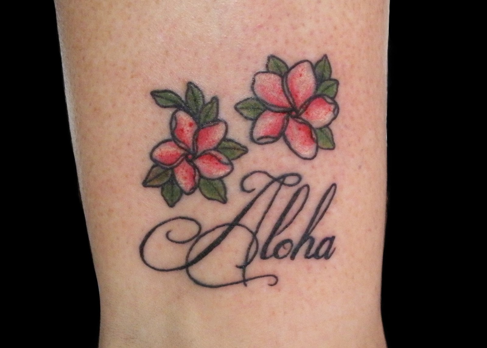 10. Band Tattoo with Hawaiian Flowers - wide 7