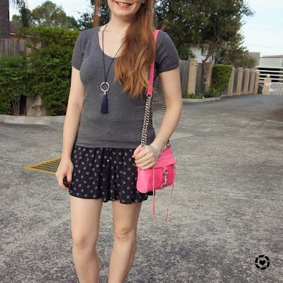 awayfromtheblue Instagram | monochromatic printed culotte shorts outfit with grey v neck tee neon pink mini MAC bag