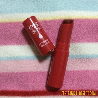 Holika Holika Waterdrop Tint Stick in 01 Waterdrop Cherry with the cap off