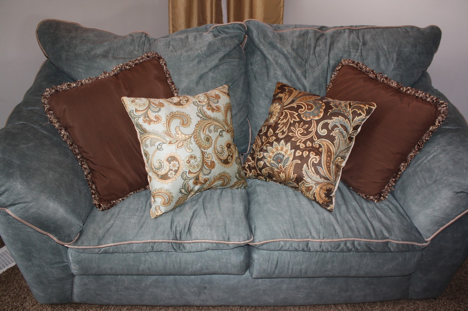 Making an Uglyish Sofa Look Better with 2 PILLOWS Making Life Blissful