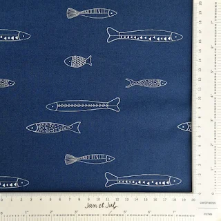 Tela de algodón americano con peces de diferentes formas y medidas