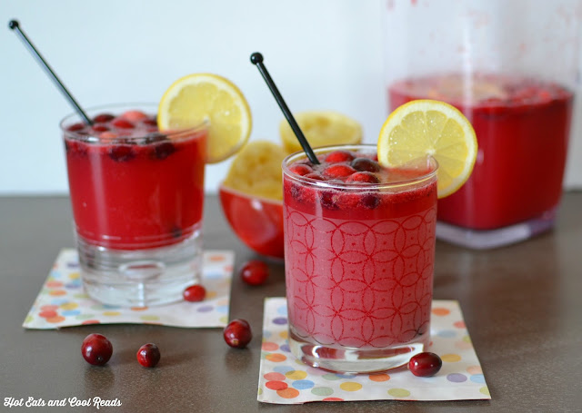 Cranberry Citrus Almond Holiday Punch Recipe from Hot Eats and Cool Reads! This non-alcoholic drink is tasty, family friendly and festive! Great for any holiday including Christmas, New Year's, Thanksgiving or even game day! Add your favorite vodka for a delicious adult beverage!