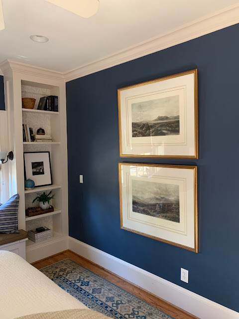 Newburyport Blue paint color on walls of bedroom by Benjamin Moore - Design by Sherry Hart. #newburyportblue #benjaminmoore #paintcolors #navybluepaint #bestnavyblue #interiordesign #bluebedroom