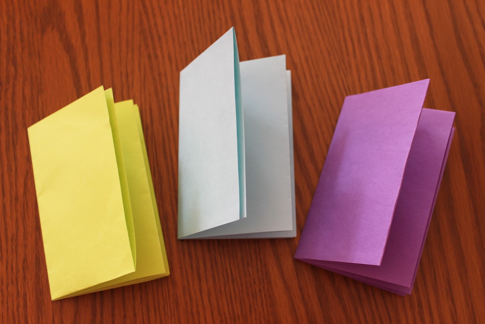 fivetenfifteen artpaperscissors tiny book {one sheet of paper