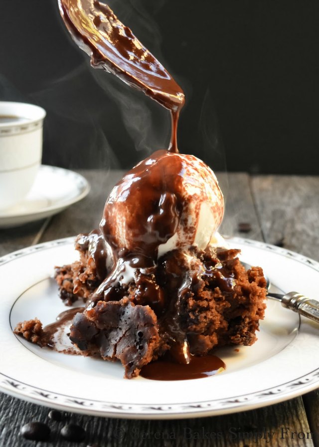 Drizzle Hot Fudge Sauce over Crock Pot Hot Fudge Cake and serve with ice cream. Such an easy crock pot recipe to make from Serena Bakes Simply From Scratch.