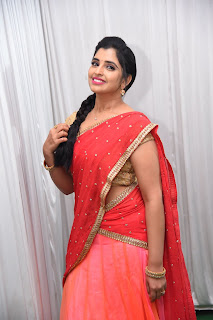 Telugu Anchor Shyamala in Pink and Red Half Saree Stills