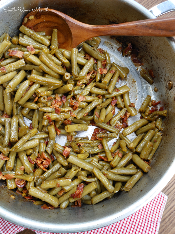 Southern-Style Canned Green Beans! The trick to making perfectly cooked Southern-style green beans with canned beans - the beans don’t fall apart but taste like they’ve cooked all day!