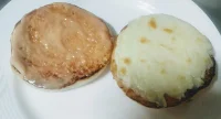 Cheese spread on one side of burger bun for veg burger recipe