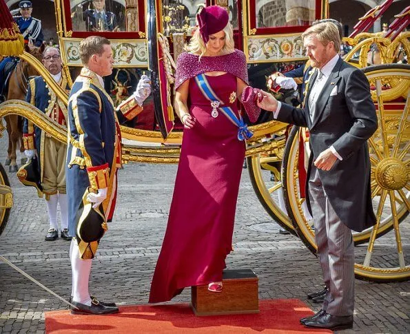 King Willem-Alexander, Prince Constantijn and Princess Laurentien. Queen Maxima wore a new dress by Jan Taminiau