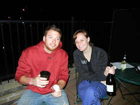Friends enjoying champagne and cupcakes Friends enjoying champagne and cupcakes
