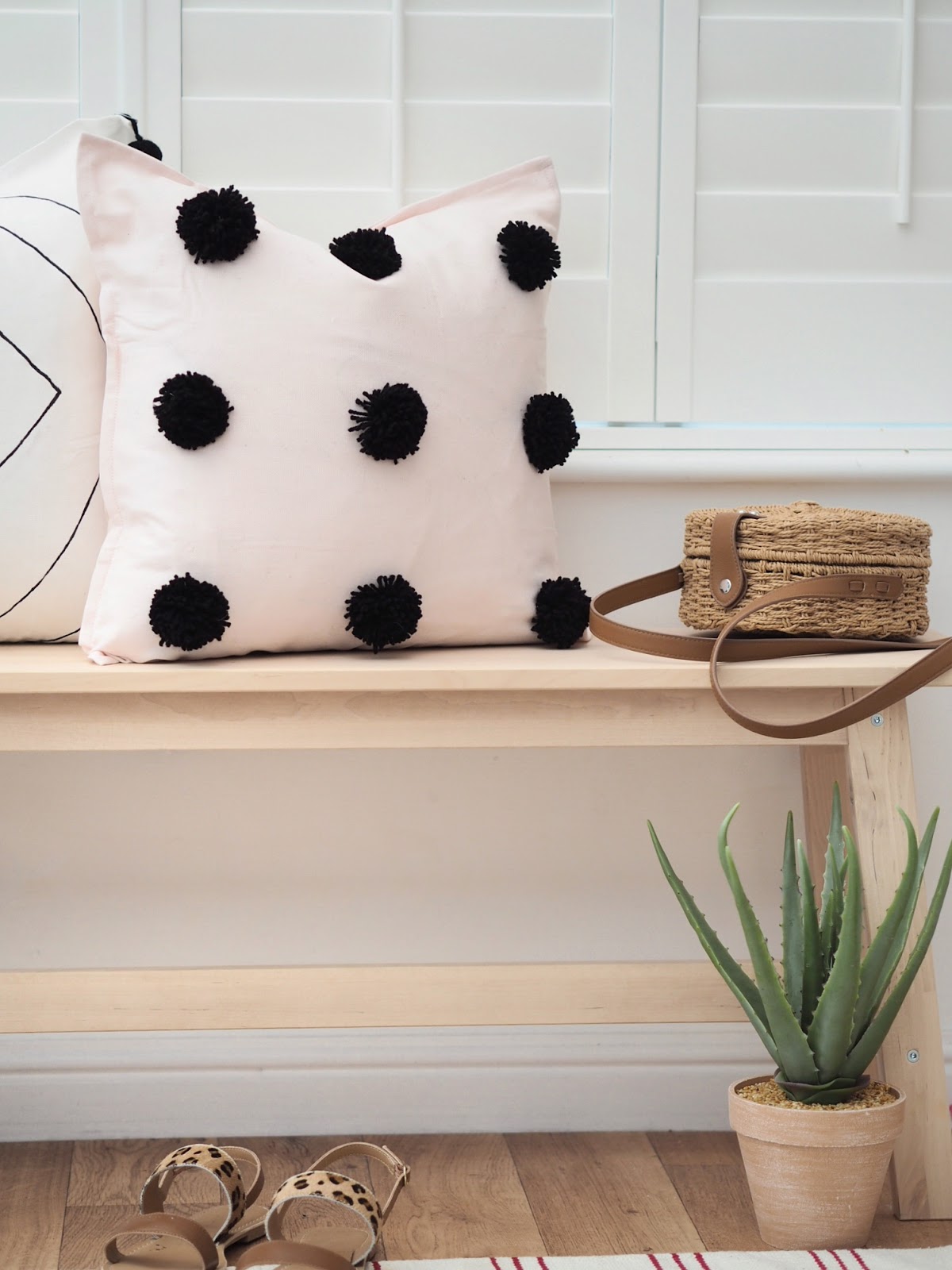 DIY tutorial boho cushion cover with woollen pom poms and tassels. Hand drawn and finished with fabric paint. DIY handmade home interiors to create luxury decor on a budget