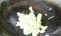 Scrambled eggs in a wok