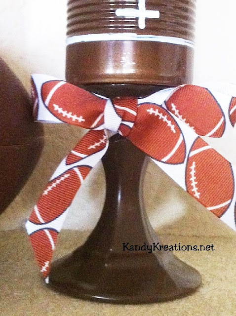 Make quick and Easy football candlesticks that add a pop of WOW! to your football party.