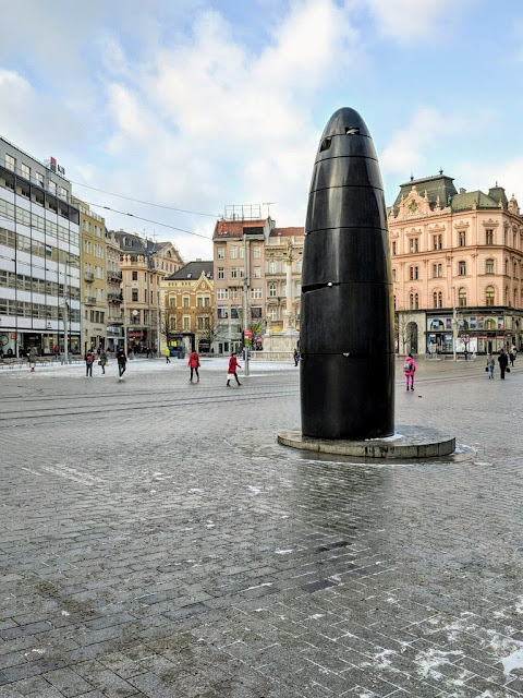 Visit Brno in winter: Bullet-shaped clock on Freedom Square