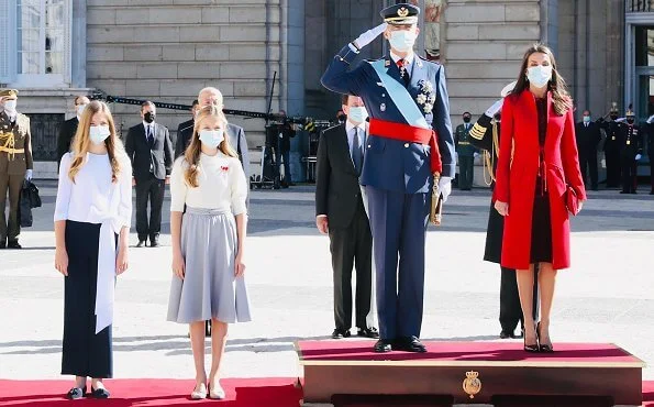 Princess Leonor and Infanta Sofia.  Felipe Varela Andrea red coat from the Spring Summer 2017 collection, Lodi pumps