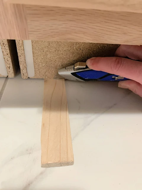 Using shims to install cabinets