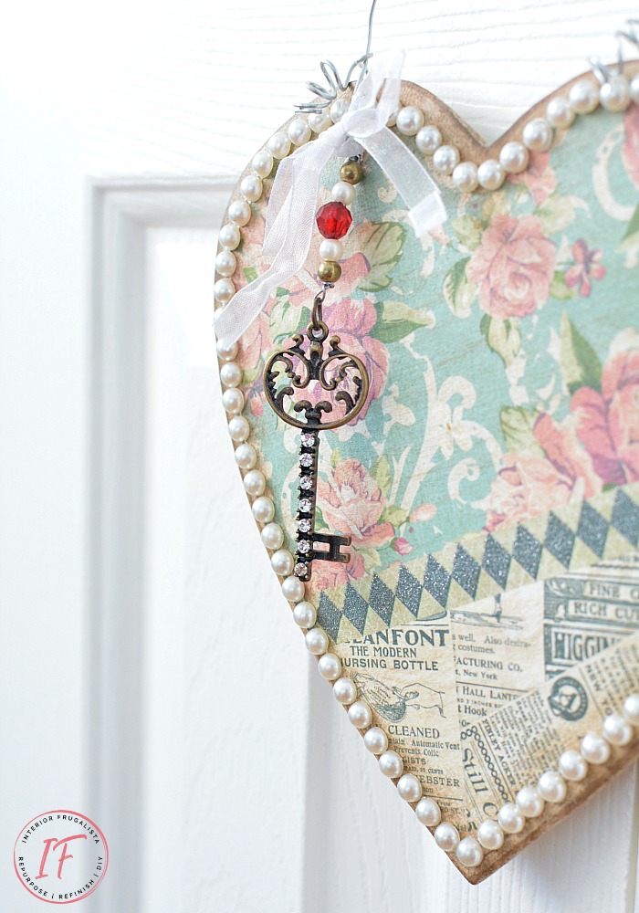 This feminine vintage-style door hanger is such an easy decoupage Valentine's day craft that could be displayed year-round or pretty wedding decor.