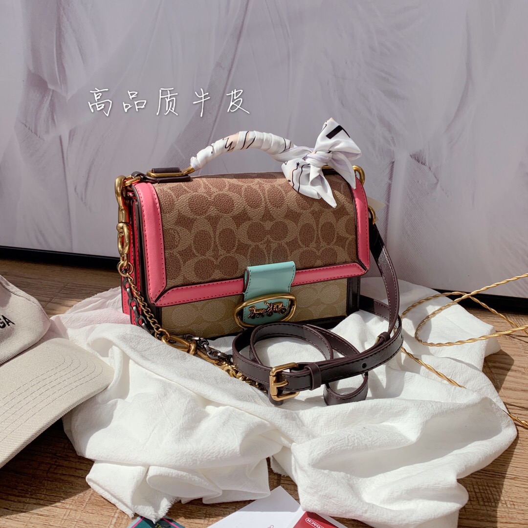 riley top handle 22 in signature canvas