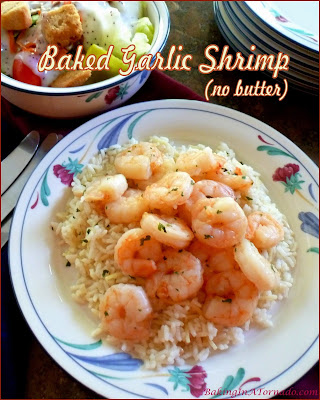 Baked Garlic Shrimp (no butter) is baked in a garlic white wine sauce for a quick and flavorful dinner. | Recipe developed by www.BakingInATornado.com | #recipe #dinner