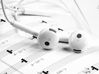 music score with headphones
