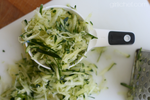 shredded zucchini in OXO measuring cup