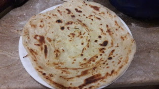 transfer-to-the-paratha-on-plate